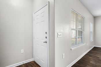 Front Door Entrance With Large Windows In The Living Area - Elms Floor Plan